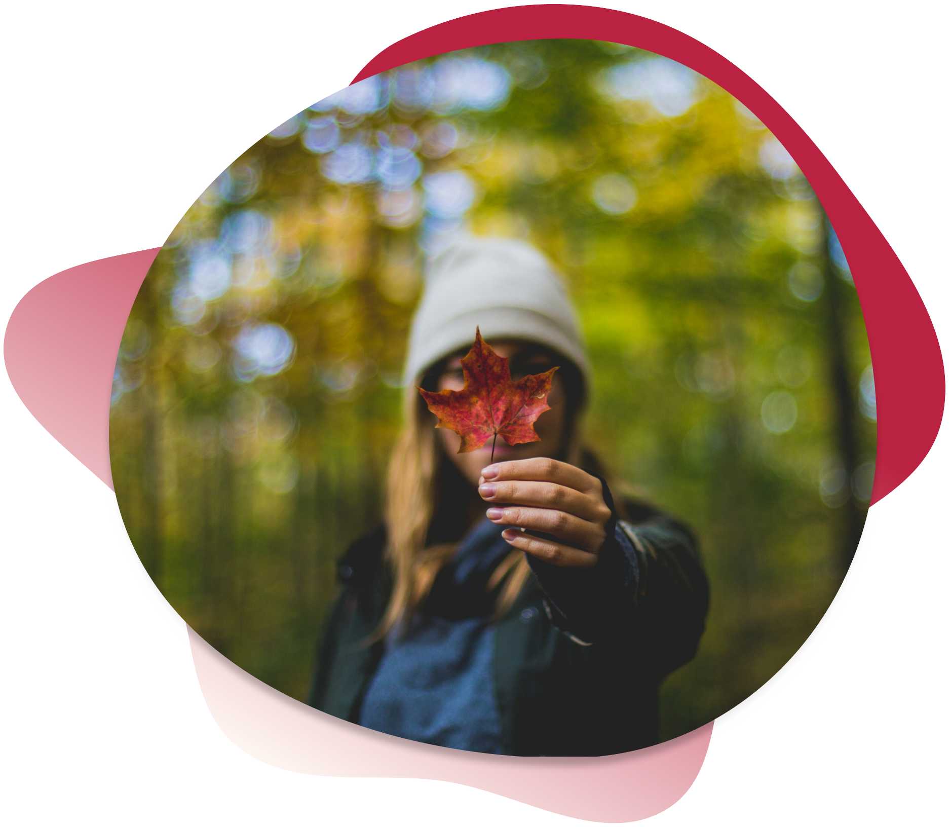 Girl holding maple leaf